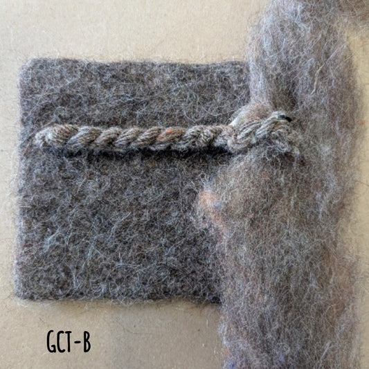 Warm grey roving with browns, orange and greys. for weaving, hand spinning, and felting.