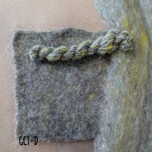 Lively roving with streaks of yellow, green, blue and grey for hand spinning, felting, and weaving.