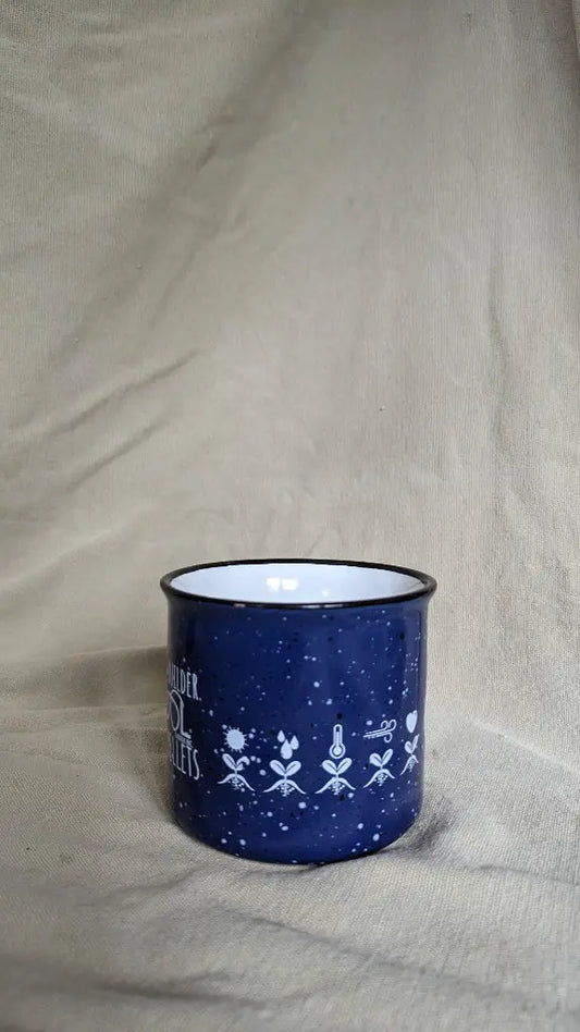 Blue ceramic EcoWool mug with white interior and EcoWool logo on it