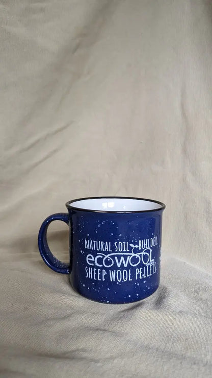 Blue ceramic EcoWool mug with white interior and EcoWool logo on it