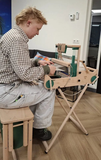 Adjustable weaving bench